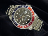 PRE OWNED MENS ROLEX STAINLESS STEEL GMT-MASTER PEPSI WITH A BLACK DIAL 16700