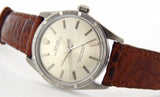 PRE OWNED MENS ROLEX STAINLESS STEEL OYSTER PERPETUAL WITH A SILVER DIAL 1007