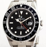 PRE OWNED MENS ROLEX STAINLESS STEEL GMT MASTER II WITH A BLACK DIAL 16710