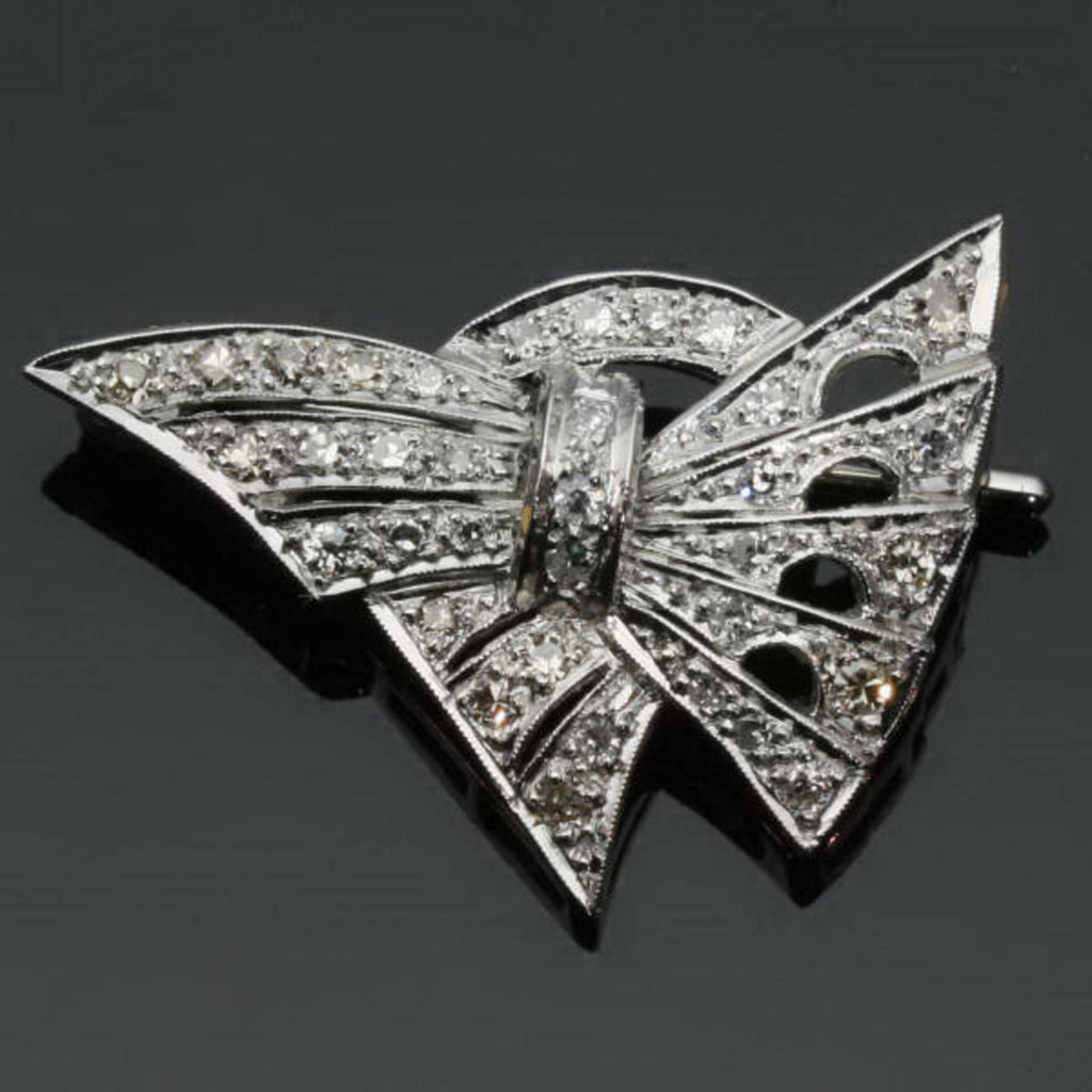 Decorative platinum estate bow brooch