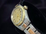 PRE OWNED LADIES ROLEX TWO-TONE OYSTER PERPETUAL WITH A CHAMPAGNE DIAL 6618