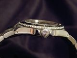 PRE OWNED MENS ROLEX STAINLESS STEEL SUBMARINER WITH A BLACK DIAL 14060