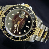 PRE OWNED MENS ROLEX TWO-TONE GMT-MASTER WITH A BLACK DIAL 16713