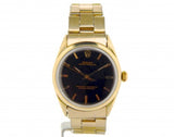 PRE OWNED MENS ROLEX GOLD SHELL OYSTER PERPETUAL WITH A BLACK DIAL 1024