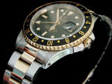 PRE OWNED MENS ROLEX TWO-TONE GMT-MASTER II WITH A BLACK DIAL 16713
