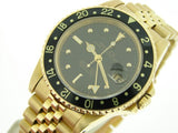 PRE OWNED MENS ROLEX YELLOW GOLD GMT-MASTER WITH A BLACK DIAL 16758