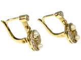 Two tone gold earrings with diamonds