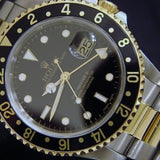 PRE OWNED MENS ROLEX TWO-TONE GMT-MASTER WITH A BLACK DIAL 16713