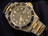 PRE OWNED MENS ROLEX TWO-TONE SUBMARINER DATE WITH A BLACK DIAL 1680