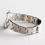 PRE OWNED LADIES ROLEX STAINLESS STEEL OYSTER PERPETUAL WITH A SALMON DIAL 76080