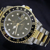 PRE OWNED MENS ROLEX TWO-TONE GMT-MASTER WITH A BLACK DIAL 16713