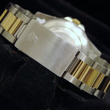 PRE OWNED MENS ROLEX TWO-TONE GMT-MASTER WITH A BLACK DIAL 16713