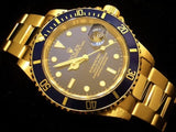 PRE OWNED MENS ROLEX YELLOW GOLD SUBMARINER DATE WITH A BLUE DIAL 16618