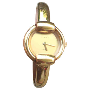 Gucci horsebit gold steel watch
