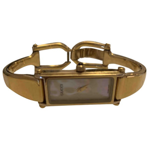 Gucci gold steel watch