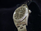 PRE OWNED LADIES ROLEX STAINLESS STEEL OYSTER PERPETUAL WITH A BLACK DIAL 76030