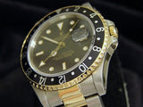 PRE OWNED MENS ROLEX TWO-TONE GMT-MASTER II WITH A BLACK DIAL 16713