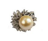 A pearl and diamond dress ring