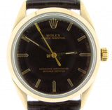 PRE OWNED MENS ROLEX GOLD SHELL OYSTER PERPETUAL WITH A BLACK DIAL 1024