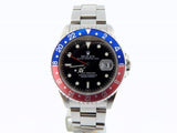 PRE OWNED MENS ROLEX STAINLESS STEEL GMT-MASTER PEPSI WITH A BLACK DIAL 16700