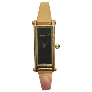 Gucci gold steel watch