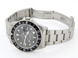 PRE OWNED MENS ROLEX STAINLESS STEEL GMT MASTER II WITH A BLACK DIAL 16710