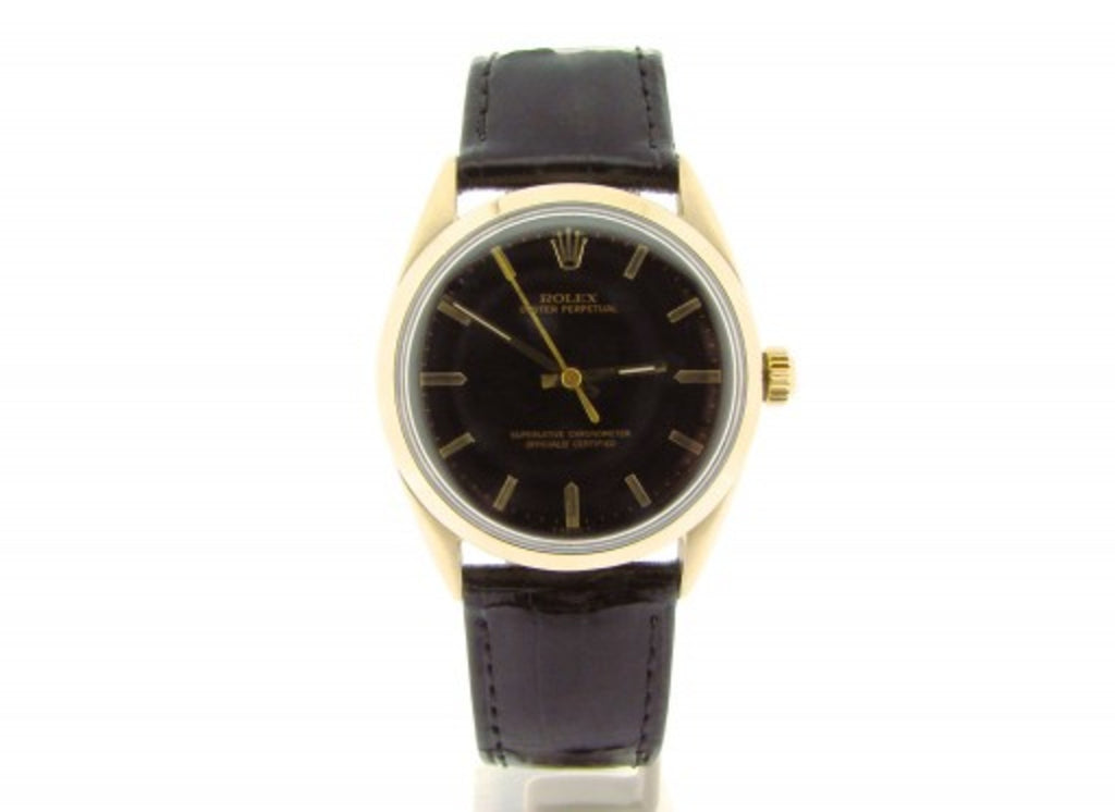 PRE OWNED MENS ROLEX GOLD SHELL OYSTER PERPETUAL WITH A BLACK DIAL 1024
