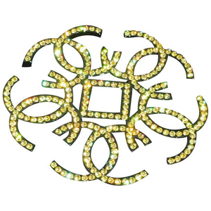 Chanel yellow metal pins & brooches