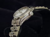 PRE OWNED LADIES ROLEX STAINLESS STEEL OYSTER PERPETUAL WITH A WHITE ROMAN DIAL