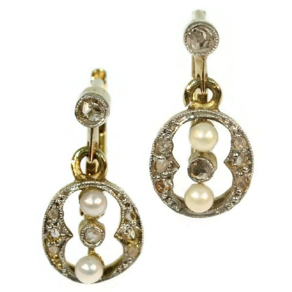 Two tone gold earrings with diamonds