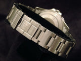 PRE OWNED MENS ROLEX STAINLESS STEEL GMT-MASTER WITH A BLACK DIAL 16700