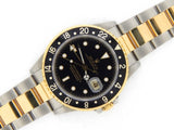 PRE OWNED MENS ROLEX TWO-TONE GMT-MASTER II WITH A BLACK DIAL 16713