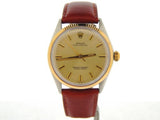 PRE OWNED MENS ROLEX TWO-TONE OYSTER PERPETUAL WITH A CHAMPAGNE DIAL 1005