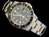 PRE OWNED MENS ROLEX TWO-TONE GMT-MASTER II WITH A BLACK DIAL 16713