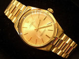 PRE OWNED MENS ROLEX YELLOW GOLD OYSTER PERPETUAL WITH A CHAMPAGNE DIAL 1003