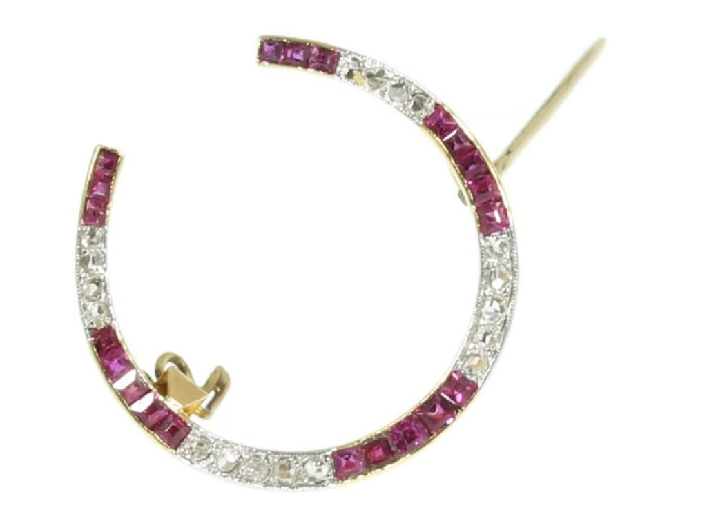 Art Deco horse shoe brooch with rubies