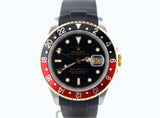 PRE OWNED MENS ROLEX TWO-TONE GMT-MASTER II COKE WITH A BLACK DIAL 16713