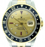 PRE OWNED MENS ROLEX TWO-TONE GMT-MASTER II WITH A GOLD SERTI DIAL 16713