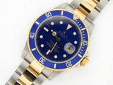 PRE OWNED MENS ROLEX TWO-TONE SUBMARINER DATE WITH A BLUE DIAL 16613T