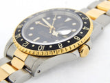 PRE OWNED MENS ROLEX TWO-TONE GMT-MASTER II WITH A BLACK DIAL 16713